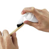 Brosse à dents avec mousse de blanchiment Diamond Smile sur fond blanc