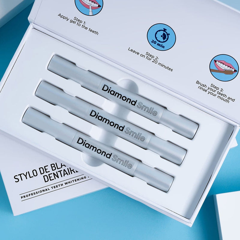 Boîte de blanchiment de Diamond Smile - Boîte de blanchiment des dents sur fond bleu