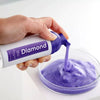 Diamond Smile Blanchiment des dents Mousse violette sur fond blanc