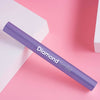 Diamond Smile Violet Crayon de blanchiment des dents sur fond rose