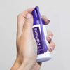 Diamond Smile Blanchiment des dents Mousse de correction de couleur violette dans une main